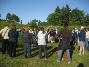 Tourists gather around the Money Pit