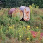 Old tanks from previous excavations of Oak Island